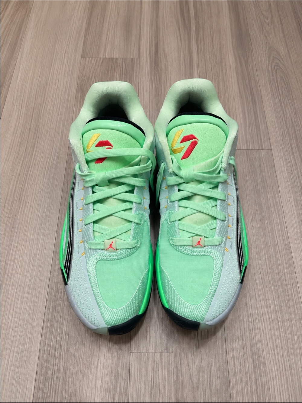 Jordan Men's Mint Green Athletic Basketball Shoes with Neon Accents